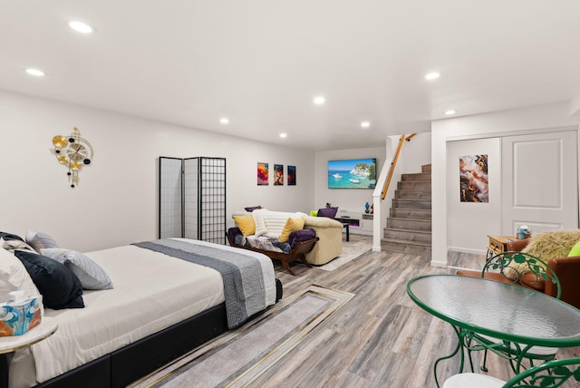 343 Webb Ranch Rd, Pie Town, NM 87827 - bedroom with light wood-style flooring and recessed lighting
