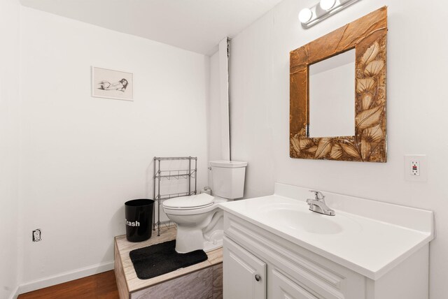 343 Webb Ranch Rd, Pie Town, NM 87827 - half bath with vanity and wood finished floors