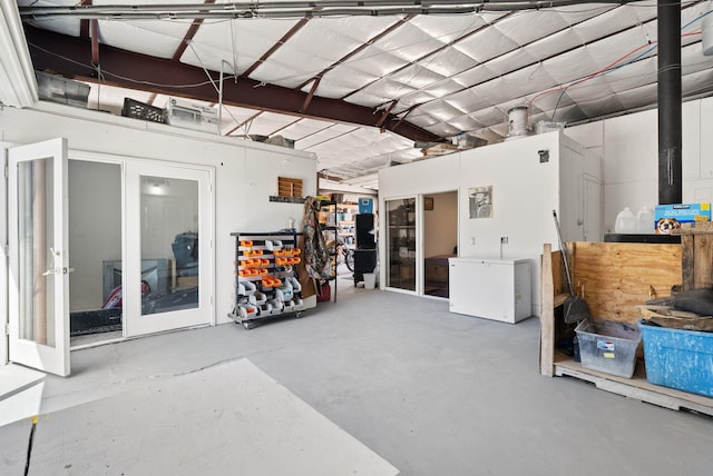 343 Webb Ranch Rd, Pie Town, NM 87827 - garage with white refrigerator