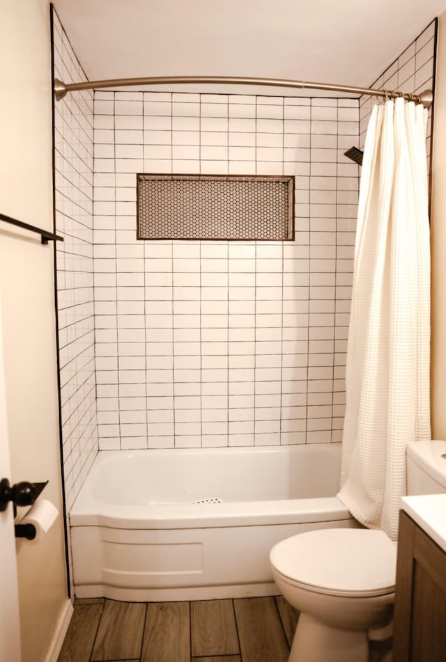 9002 Phoenix Ave NE, Albuquerque, NM 87112 - bathroom featuring shower / bath combination with curtain, vanity, and wood finished floors