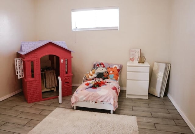 9002 Phoenix Ave NE, Albuquerque, NM 87112 - bedroom with wood finished floors and baseboards