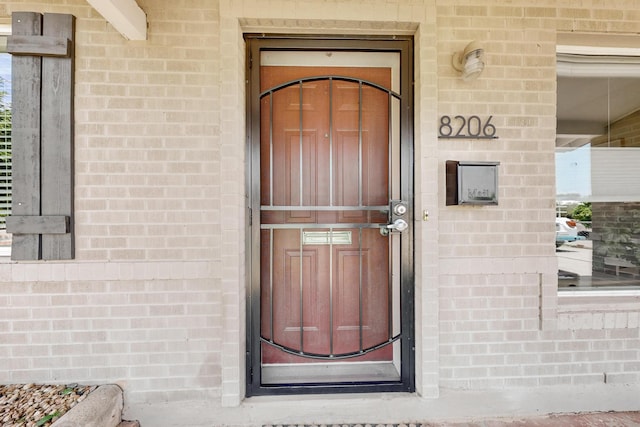 8206 Morrow Ave NE, Albuquerque, NM 87110 - property entrance featuring brick siding