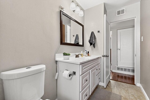 8206 Morrow Ave NE, Albuquerque, NM 87110 - bathroom with vanity and marble look tiles