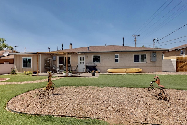 8206 Morrow Ave NE, Albuquerque, NM 87110 - back of property featuring brick siding and a patio area