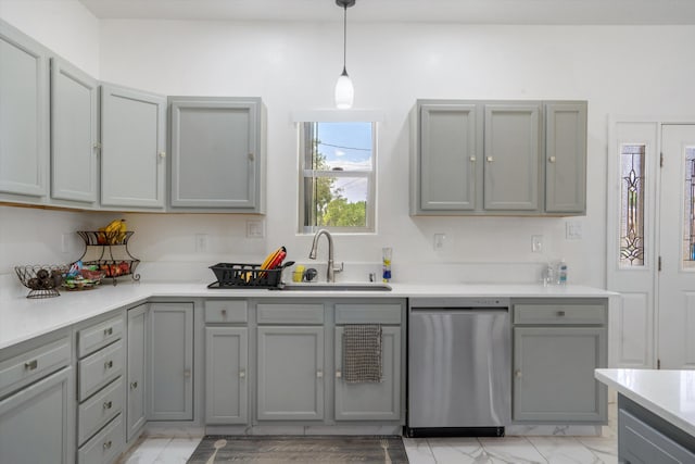 9 Elias Rd, Los Lunas, NM 87031 - kitchen featuring stainless steel dishwasher, gray cabinets, light marble finish flooring, and light countertops