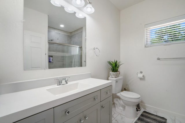 9 Elias Rd, Los Lunas, NM 87031 - bathroom featuring a shower stall, marble finish floors, and vanity