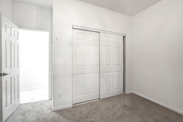 9 Elias Rd, Los Lunas, NM 87031 - unfurnished bedroom featuring carpet floors and a closet