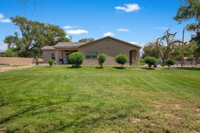 9 Elias Rd, Los Lunas, NM 87031 - rear view of house with stucco siding