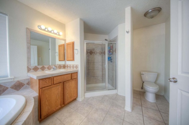 1543 White Pine Dr, Rio Rancho, NM 87144 - full bath with a bath, vanity, a stall shower, tile patterned flooring, and backsplash