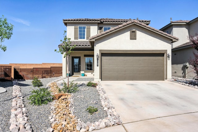3209 Tazanita Loop SE, Rio Rancho, NM 87124 - view of front of house featuring a tile roof, stucco siding, driveway, and a garage