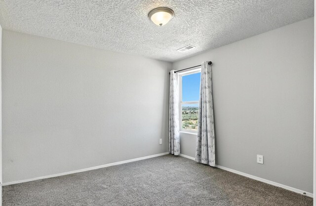 3209 Tazanita Loop SE, Rio Rancho, NM 87124 - carpeted spare room with a textured ceiling and baseboards