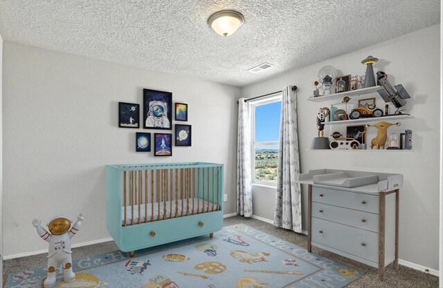 3209 Tazanita Loop SE, Rio Rancho, NM 87124 - bedroom with a textured ceiling and carpet