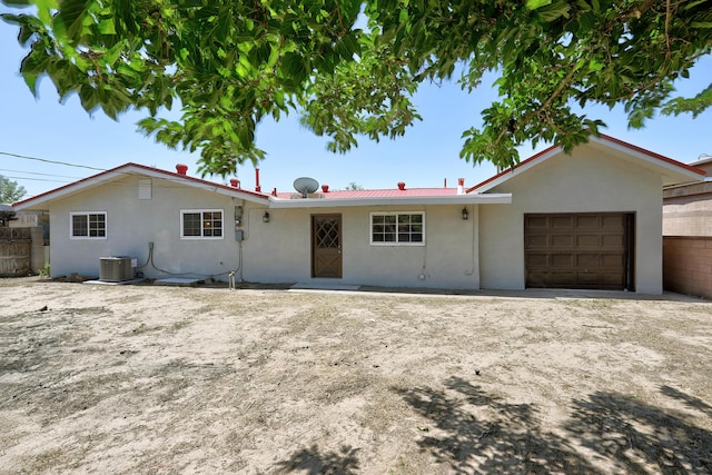 5711 Bohemio Ct SW, Albuquerque, NM 87105 - ranch-style house featuring stucco siding, a garage, and driveway