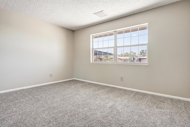 5711 Bohemio Ct SW, Albuquerque, NM 87105 - unfurnished room featuring carpet and a textured ceiling