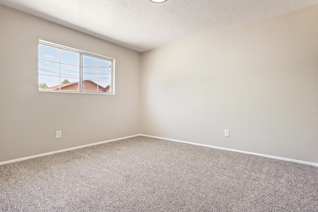 5711 Bohemio Ct SW, Albuquerque, NM 87105 - empty room featuring carpet floors and a textured ceiling