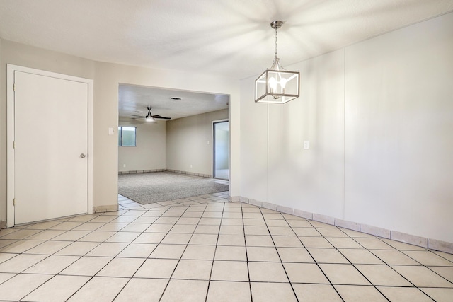 5711 Bohemio Ct SW, Albuquerque, NM 87105 - spare room with a ceiling fan and a chandelier