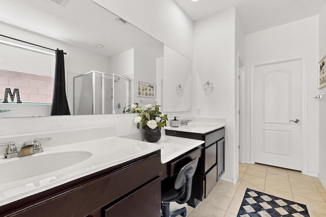 11805 Badger Mountain Trl NW, Albuquerque, NM 87120 - bathroom with a shower stall, tile patterned flooring, and double vanity