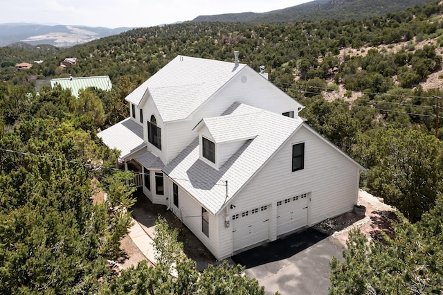 8 Fawn Rd, Cedar Crest, NM 87008 - view from above of property with a forest and mountains