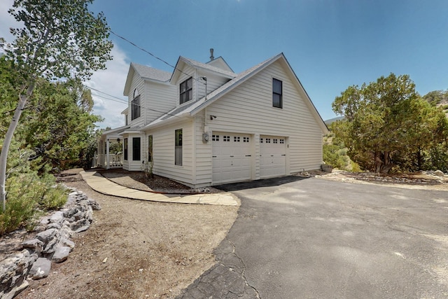 8 Fawn Rd, Cedar Crest, NM 87008 - view of side of home featuring asphalt driveway