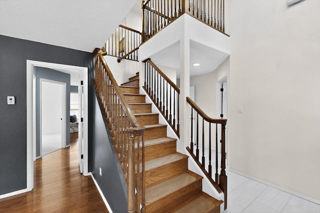 8 Fawn Rd, Cedar Crest, NM 87008 - staircase featuring a towering ceiling