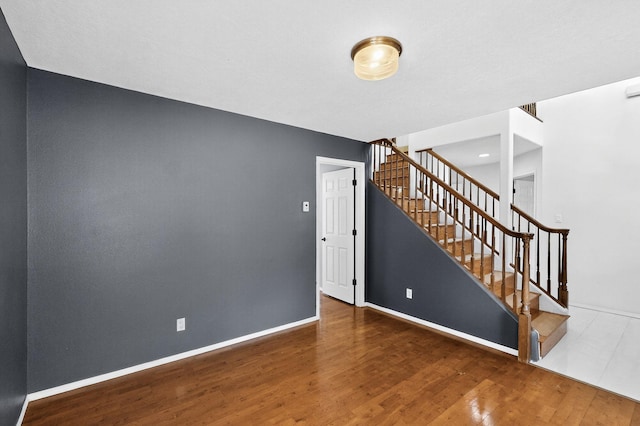 8 Fawn Rd, Cedar Crest, NM 87008 - stairs with wood finished floors and baseboards