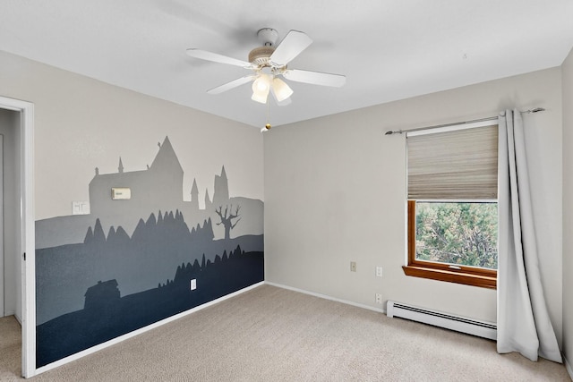 8 Fawn Rd, Cedar Crest, NM 87008 - unfurnished room with a baseboard radiator, a ceiling fan, and carpet