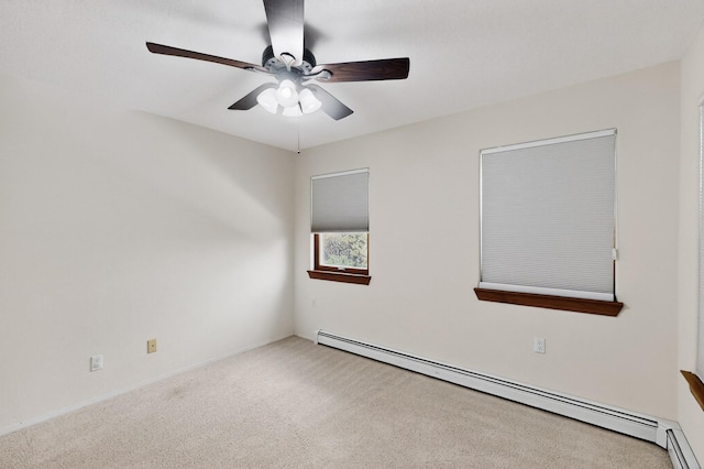 8 Fawn Rd, Cedar Crest, NM 87008 - spare room featuring a baseboard heating unit, carpet, and ceiling fan