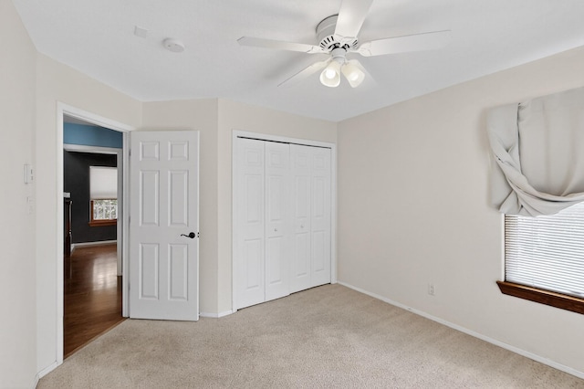 8 Fawn Rd, Cedar Crest, NM 87008 - unfurnished bedroom featuring light carpet, a closet, and a ceiling fan