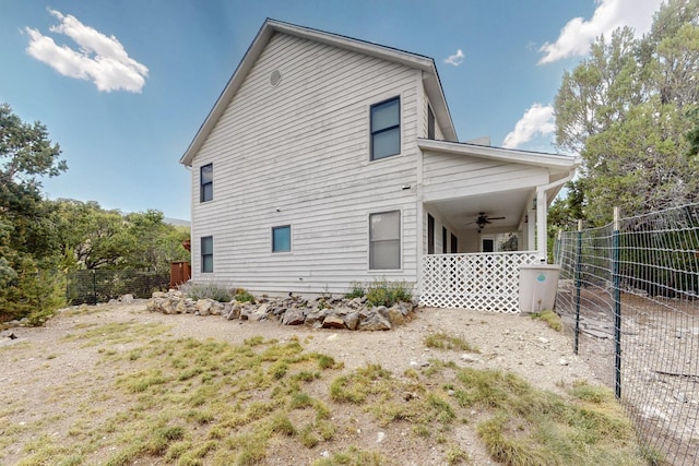 8 Fawn Rd, Cedar Crest, NM 87008 - view of side of home with a ceiling fan and a porch