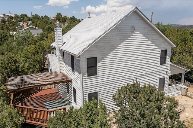 8 Fawn Rd, Cedar Crest, NM 87008 - view of side of home with a chimney