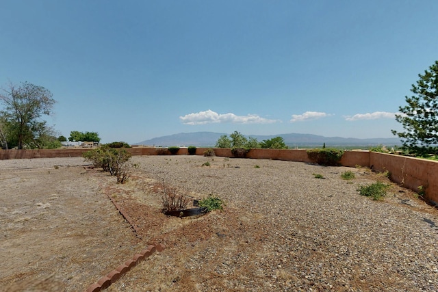 4904 Alberta Ln NW, Albuquerque, NM 87120 - fenced backyard featuring a mountain view