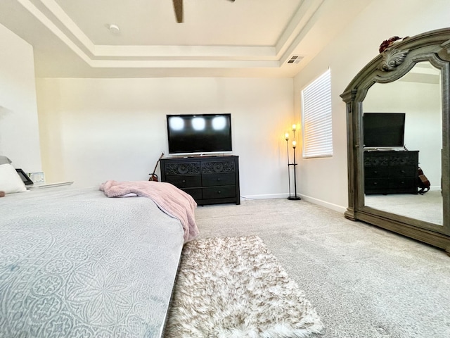 3237 Fennel Rd NE, Rio Rancho, NM 87144 - carpeted bedroom featuring a tray ceiling and baseboards