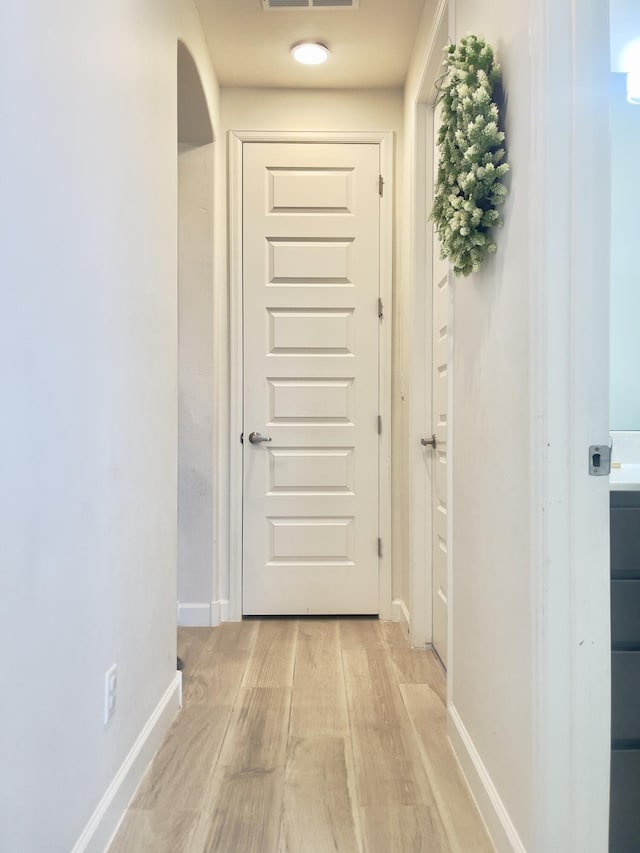3237 Fennel Rd NE, Rio Rancho, NM 87144 - corridor with light wood-style flooring and baseboards