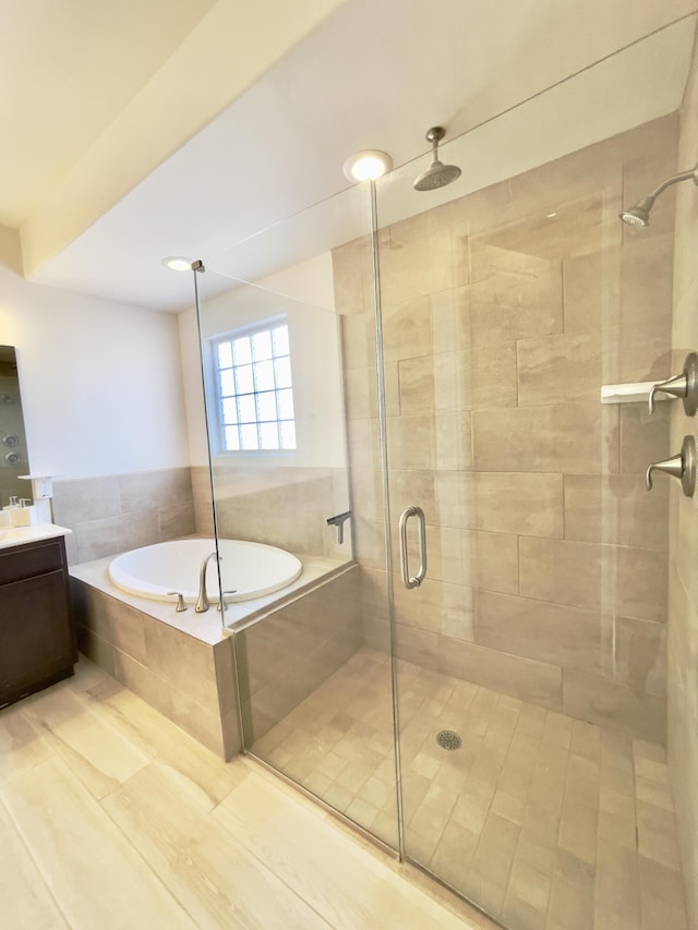 3237 Fennel Rd NE, Rio Rancho, NM 87144 - full bathroom featuring a stall shower, a bath, and vanity