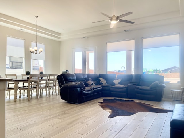 3237 Fennel Rd NE, Rio Rancho, NM 87144 - living area featuring light wood-style flooring, a chandelier, and ceiling fan