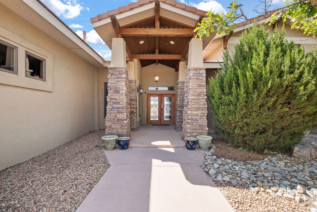 2632 Globe Ct NE, Rio Rancho, NM 87124 - view of exterior entry featuring french doors and stucco siding