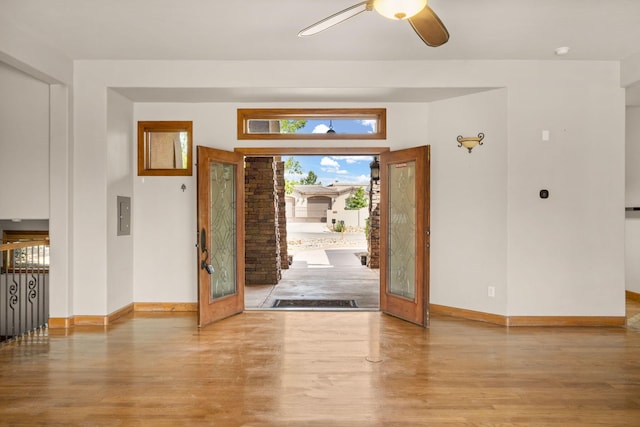 2632 Globe Ct NE, Rio Rancho, NM 87124 - foyer featuring wood finished floors, a ceiling fan, french doors, and electric panel