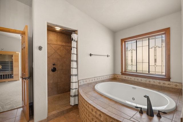 2632 Globe Ct NE, Rio Rancho, NM 87124 - bathroom featuring a whirlpool tub, tiled shower, and tile patterned flooring