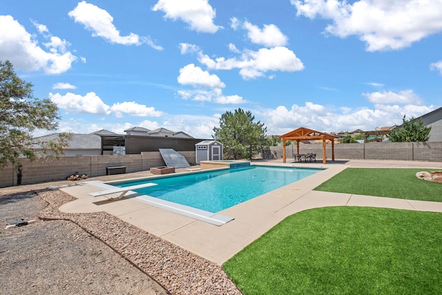 2632 Globe Ct NE, Rio Rancho, NM 87124 - view of swimming pool with a gazebo, a storage shed, a fenced backyard, a patio, and a diving board