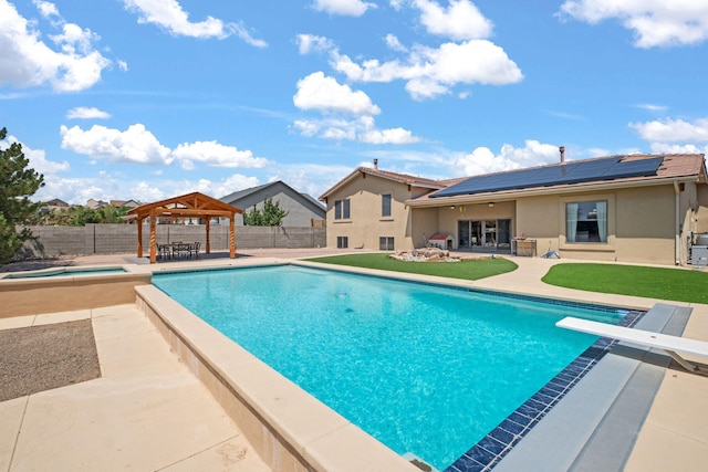 2632 Globe Ct NE, Rio Rancho, NM 87124 - view of swimming pool with a gazebo, a fenced backyard, a patio area, and a diving board