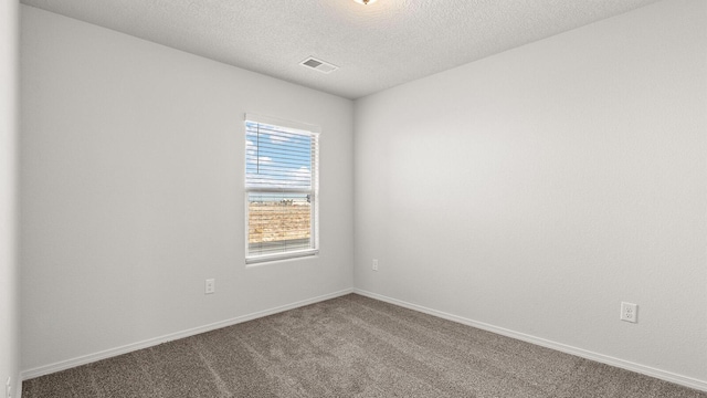 5623 Sagan Loop SE, Albuquerque, NM 87106 - carpeted empty room featuring a textured ceiling and baseboards