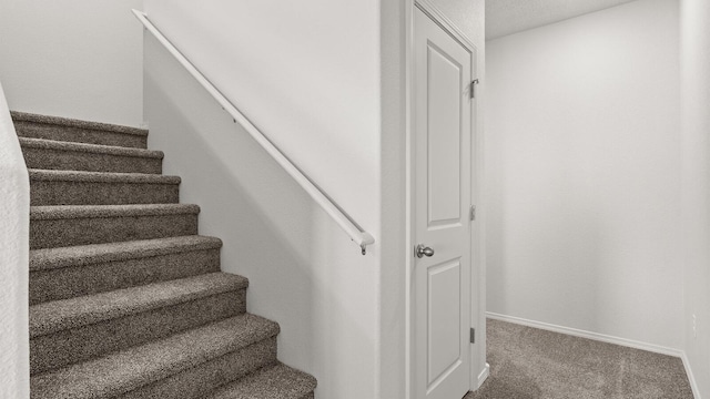 5623 Sagan Loop SE, Albuquerque, NM 87106 - staircase with carpet flooring and baseboards