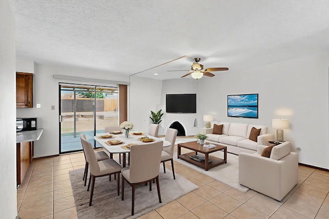 5207 Russell Dr NW, Albuquerque, NM 87114 - dining space featuring light tile patterned flooring and a ceiling fan