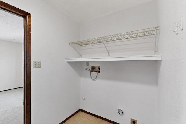 5207 Russell Dr NW, Albuquerque, NM 87114 - laundry area featuring electric dryer hookup and washer hookup