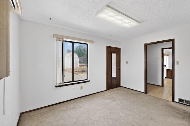 5207 Russell Dr NW, Albuquerque, NM 87114 - empty room featuring light colored carpet and a textured ceiling