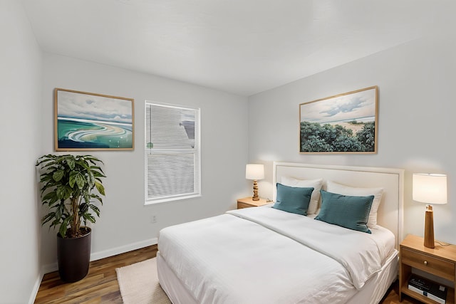 7408 Estes Park Ave NW, Albuquerque, NM 87114 - bedroom with wood finished floors and baseboards