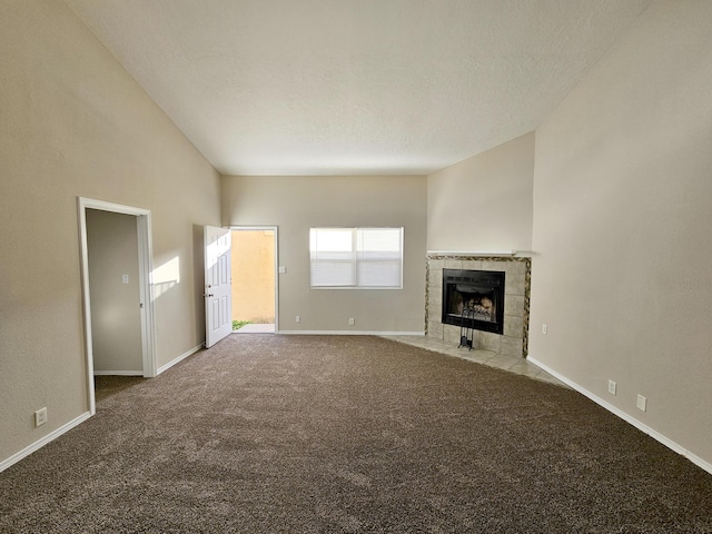 7235 Whippoorwill Ln NE, Albuquerque, NM 87109 - unfurnished living room with carpet and a tiled fireplace