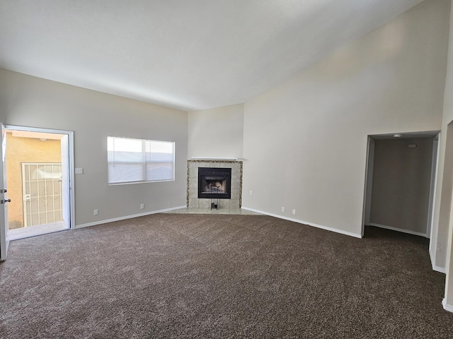 7235 Whippoorwill Ln NE, Albuquerque, NM 87109 - unfurnished living room with dark colored carpet and a fireplace