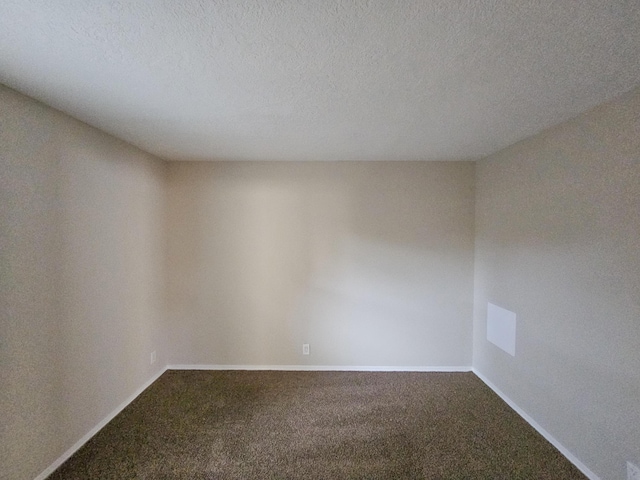 7235 Whippoorwill Ln NE, Albuquerque, NM 87109 - spare room with carpet and a textured ceiling