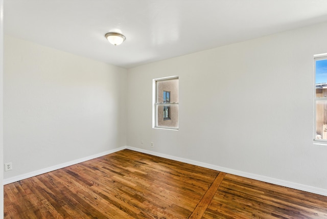 62 W B Church St, Edgewood, NM 87015 - empty room featuring wood finished floors and baseboards